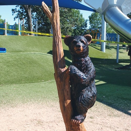 Maggie bear carving at LeFleur’s Bluff Playground