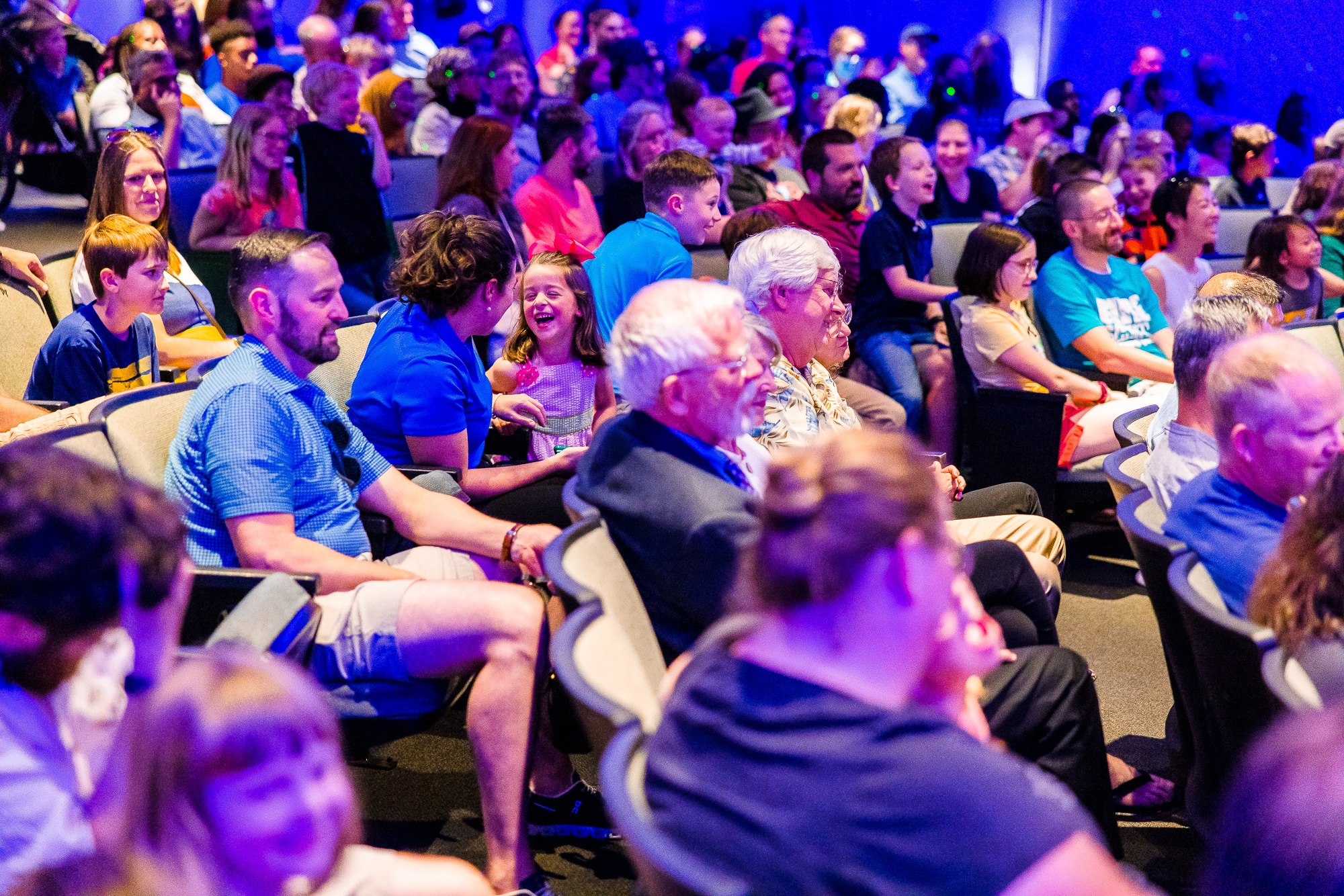 The audience participating in Dorian LaChance's magic show at the museum.