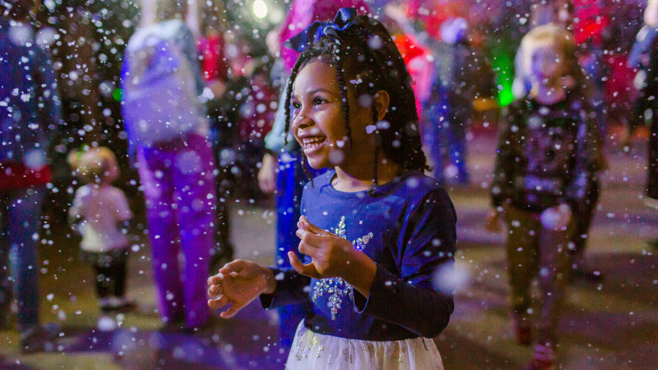 child playing at snow much fun at the Mississippi museum of natural science